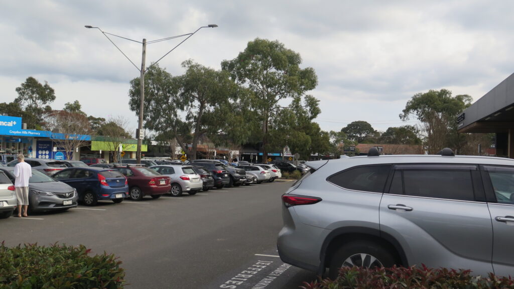 Shops and parking at McAdam Square Shopping Centre in Croydon North