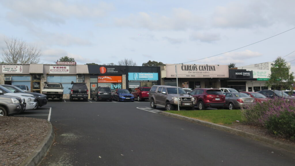 Businesses and parking at Ryland Avenue Shopping Centre in Croydon