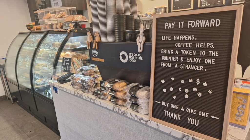 Pay-it-forward coffee board inside Ringwood Street Cafe